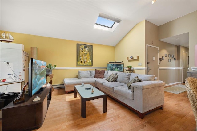 133-20 87th St Unit 3, Ozone Park, NY 11417 - living room with vaulted ceiling, light wood finished floors, a baseboard radiator, a skylight, and baseboards