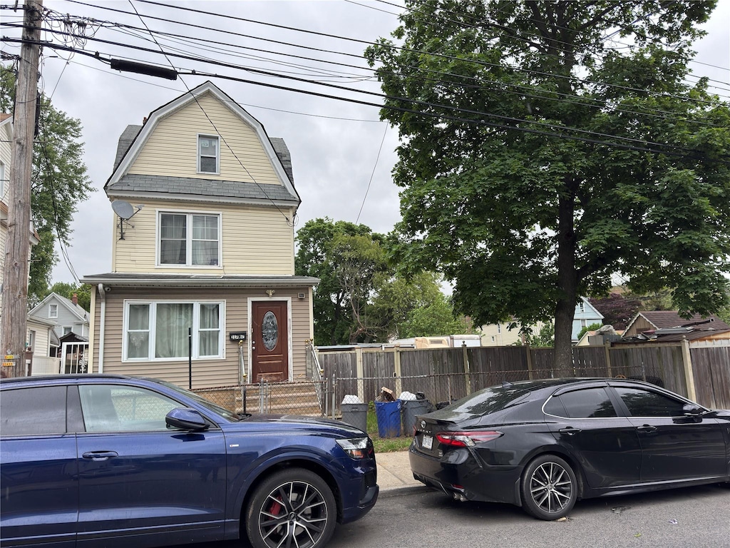 117-67 140th St, Jamaica, NY 11420 - colonial inspired home with a gambrel roof