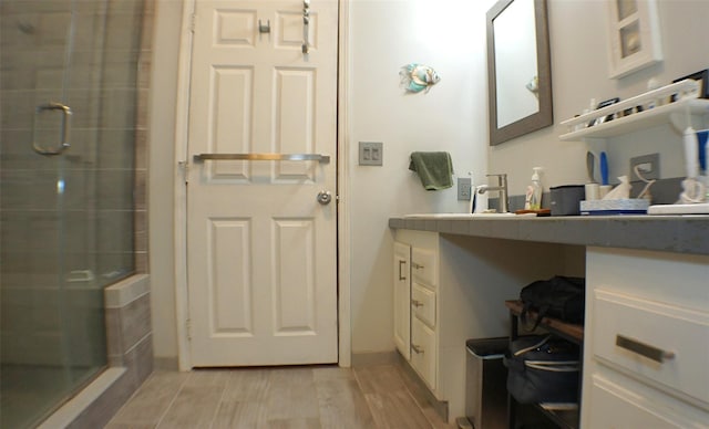 26 Saunders Ln, Wawarsing, NY 12489 - full bathroom with a shower stall, wood finished floors, and vanity