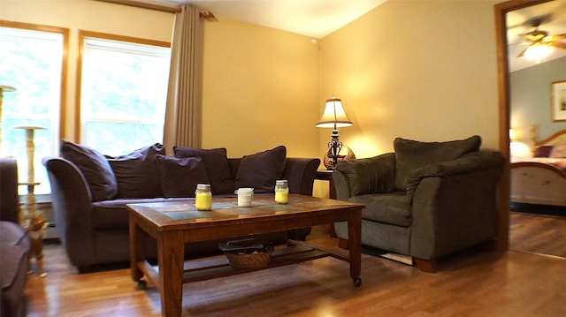 26 Saunders Ln, Wawarsing, NY 12489 - living area featuring wood finished floors, lofted ceiling, and ceiling fan