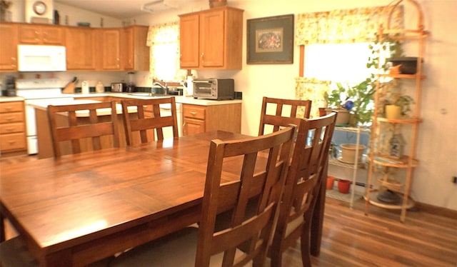 26 Saunders Ln, Wawarsing, NY 12489 - dining space with lofted ceiling and dark wood-style flooring