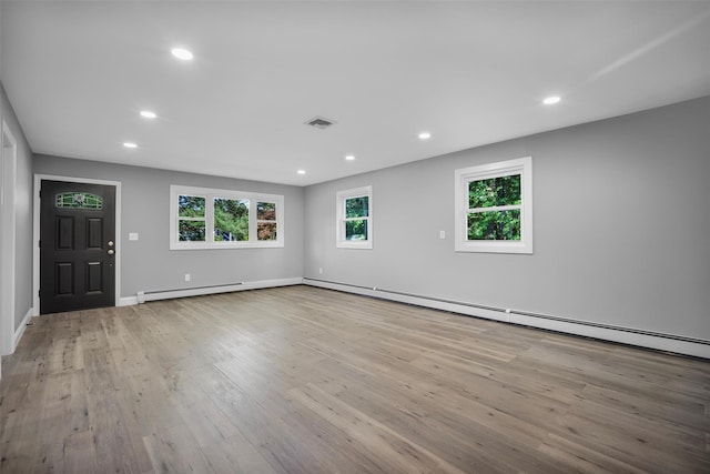 1345 Rte 82, Hopewell Junction, NY 12533 - spare room with wood finished floors, recessed lighting, baseboards, and baseboard heating
