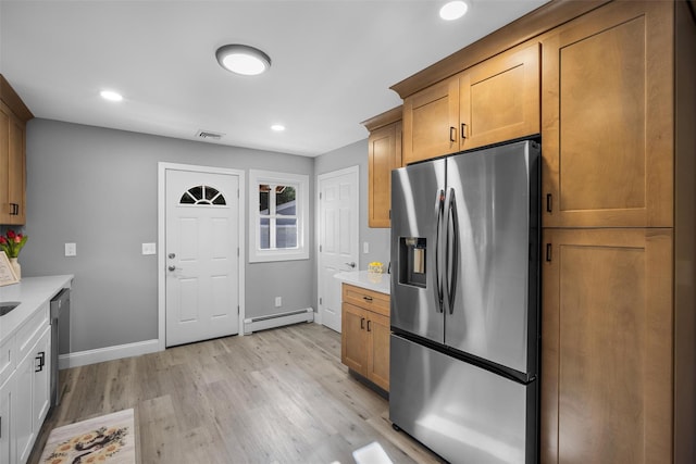1345 Rte 82, Hopewell Junction, NY 12533 - kitchen featuring stainless steel appliances, baseboard heating, light countertops, baseboards, and recessed lighting