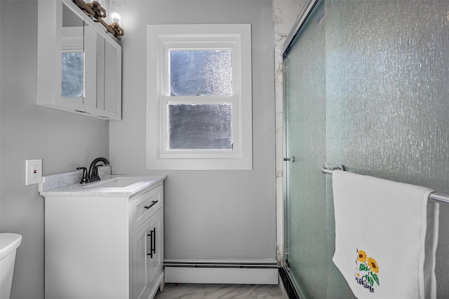 1345 Rte 82, Hopewell Junction, NY 12533 - full bathroom with a baseboard radiator, marble finish flooring, vanity, toilet, and a shower with door