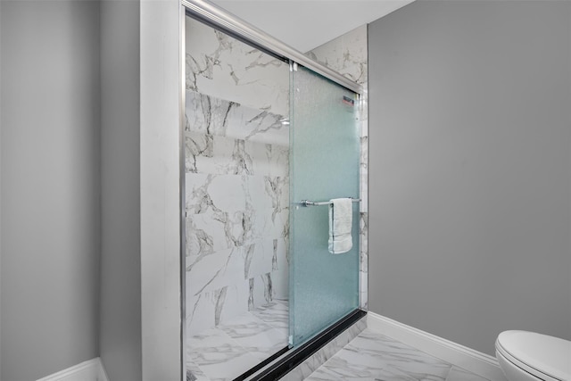 1345 Rte 82, Hopewell Junction, NY 12533 - full bathroom featuring toilet, marble look tile flooring, a marble finish shower, and baseboards