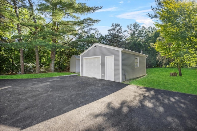 1345 Rte 82, Hopewell Junction, NY 12533 - detached garage featuring driveway and view of scattered trees