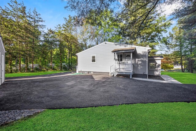 1345 Rte 82, Hopewell Junction, NY 12533 - rear view of property with a lawn