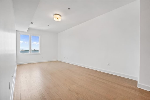 90 Bay Street Lndg Unit 6L, Staten Island, NY 10301 - spare room with light wood-type flooring and baseboards