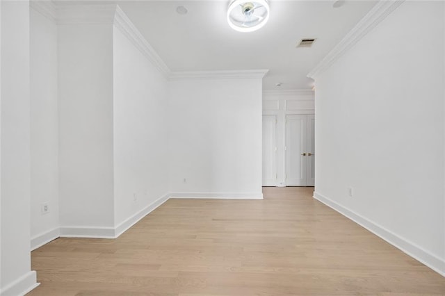 90 Bay Street Lndg Unit 6L, Staten Island, NY 10301 - empty room with light wood finished floors, crown molding, and baseboards