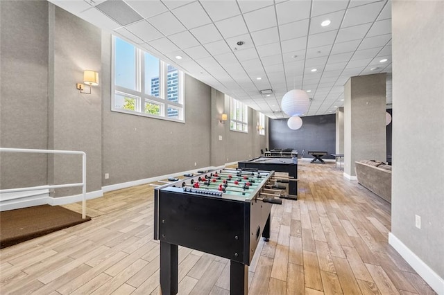 90 Bay Street Lndg Unit 6L, Staten Island, NY 10301 - rec room featuring light wood-style floors, recessed lighting, baseboards, and a drop ceiling