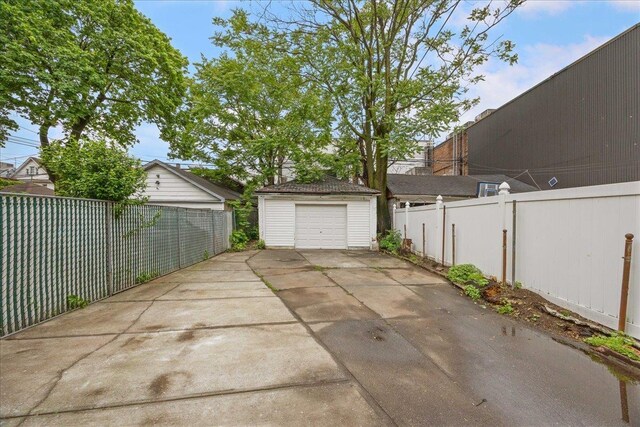 40-14 79th St, Elmhurst, NY 11373 - detached garage with concrete driveway