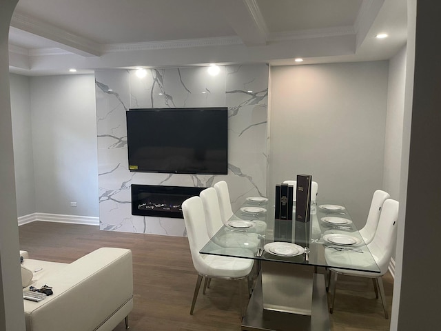 67-66 108th St Unit D5, Forest Hills, NY 11375 - dining space with ornamental molding, recessed lighting, wood finished floors, baseboards, and a premium fireplace