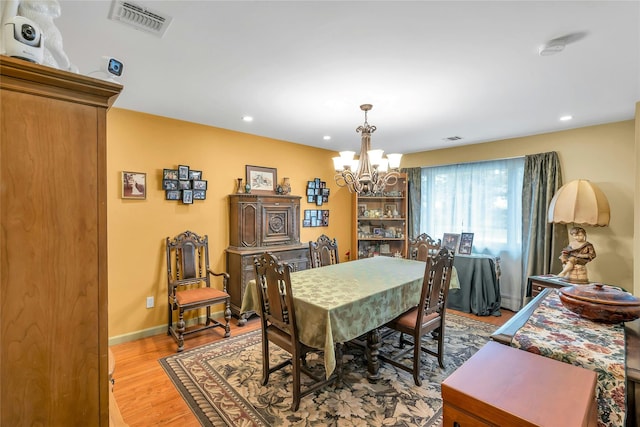 105 Browns Rd, Nesconset, NY 11767 - dining area featuring a chandelier, recessed lighting, wood finished floors, and baseboards