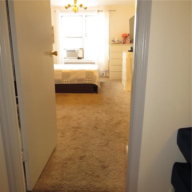 29 Abeel St Unit 6K, Yonkers, NY 10705 - carpeted bedroom featuring a chandelier