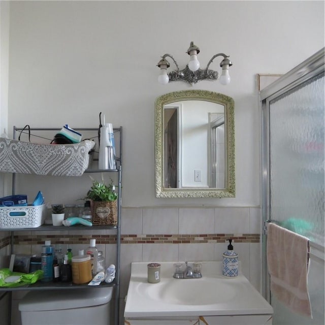29 Abeel St Unit 6K, Yonkers, NY 10705 - bathroom featuring vanity, toilet, and decorative backsplash