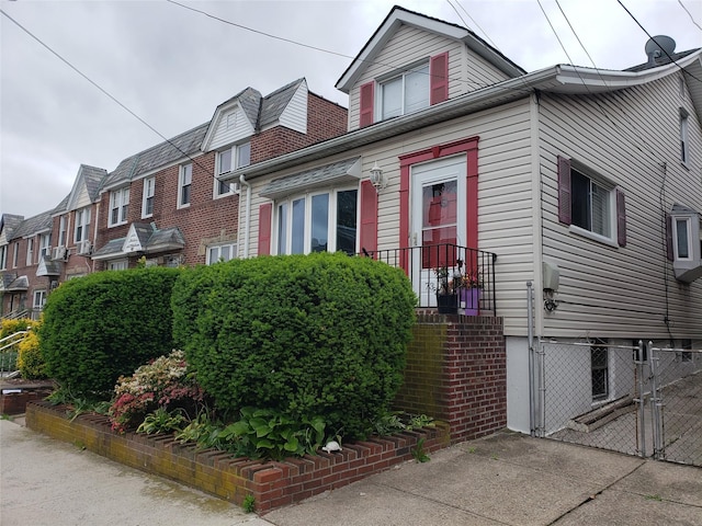 73-20 52nd Rd, Maspeth, NY 11378 - view of front of home featuring a gate and a residential view