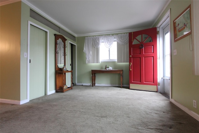 73-20 52nd Rd, Maspeth, NY 11378 - carpeted foyer featuring ornamental molding and baseboards