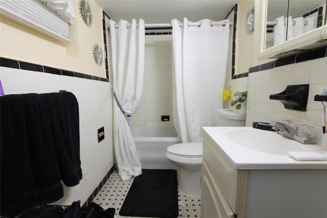 73-20 52nd Rd, Maspeth, NY 11378 - full bathroom with tile walls, shower / bath combination with curtain, tile patterned floors, toilet, and vanity