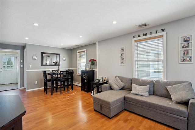 244 Laverne Ave, Holbrook, NY 11741 - living area featuring healthy amount of natural light, light wood-style flooring, recessed lighting, and baseboards
