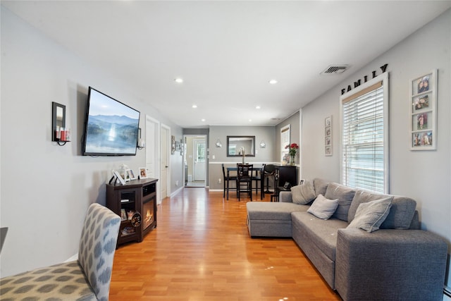 244 Laverne Ave, Holbrook, NY 11741 - living room featuring light wood-style floors and recessed lighting