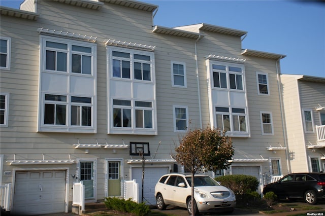 66-16 Seaspray Ave, Arverne, NY 11692 - view of property with a garage
