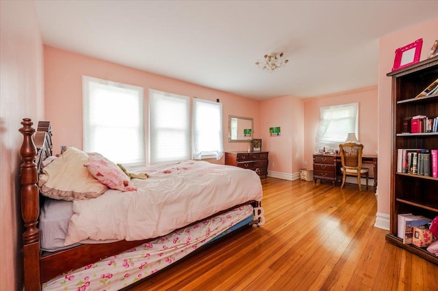 136 Linden St, Woodmere, NY 11598 - bedroom with wood-type flooring and baseboards