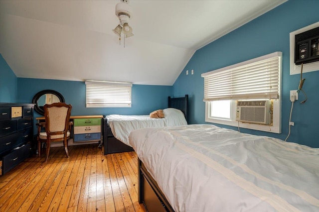 136 Linden St, Woodmere, NY 11598 - bedroom with vaulted ceiling and hardwood / wood-style flooring