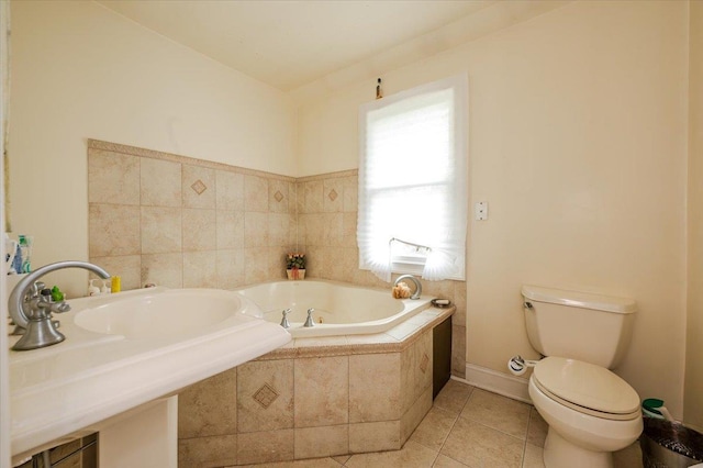 136 Linden St, Woodmere, NY 11598 - full bathroom with a garden tub, toilet, tile patterned flooring, and a sink