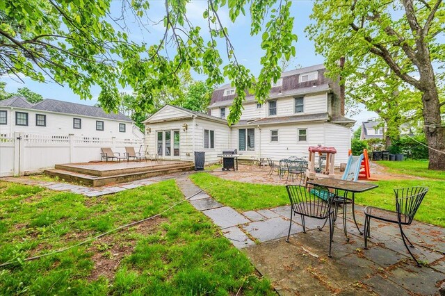 136 Linden St, Woodmere, NY 11598 - rear view of property featuring a deck and a patio area