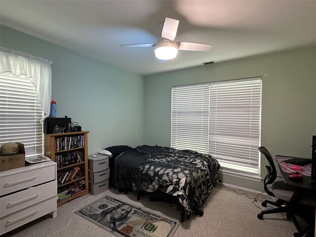 5 Baldwin Ct, Ridge, NY 11961 - carpeted bedroom with a desk and a ceiling fan