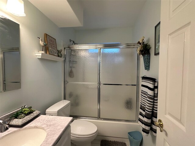 5 Baldwin Ct, Ridge, NY 11961 - full bath with vanity, toilet, and combined bath / shower with glass door