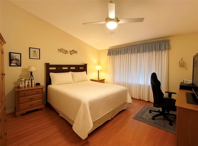 5 Baldwin Ct, Ridge, NY 11961 - bedroom with lofted ceiling, wood finished floors, ceiling fan, and an office area