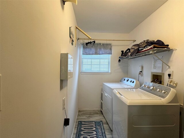 5 Baldwin Ct, Ridge, NY 11961 - washroom featuring separate washer and dryer and light wood-style floors