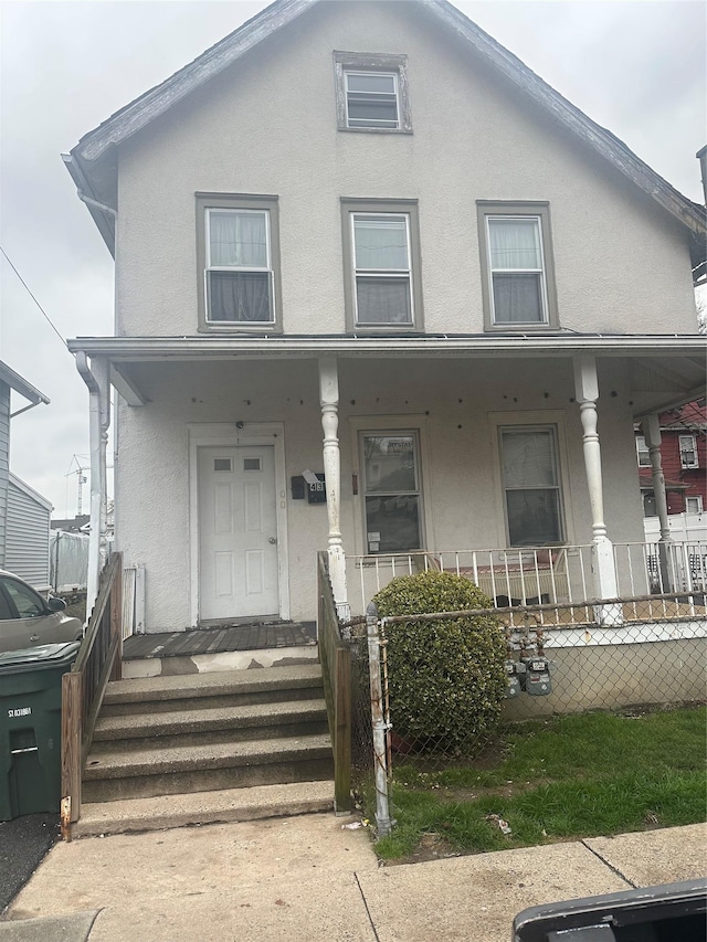 43 Oak St, Port Chester, NY 10573 - multi unit property with covered porch and stucco siding