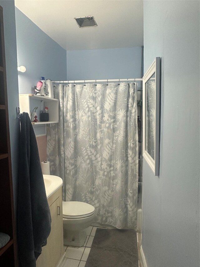 43 Oak St, Port Chester, NY 10573 - bathroom featuring tile patterned flooring, shower / bath combo, toilet, and vanity