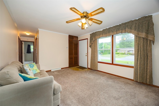 7 Sycamore Dr, Hyde Park, NY 12538 - carpeted living room with baseboards, plenty of natural light, ornamental molding, and ceiling fan