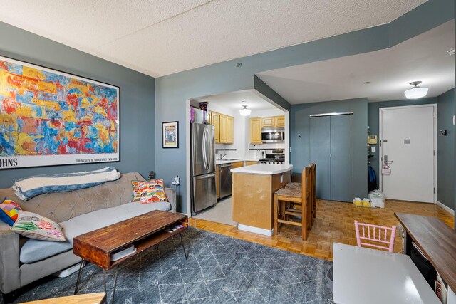 102 Bradhurst Ave Unit 906, New York Manhattan, NY 10039 - living room featuring a textured ceiling