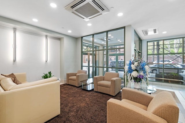 102 Bradhurst Ave Unit 906, New York Manhattan, NY 10039 - building lobby with recessed lighting and floor to ceiling windows