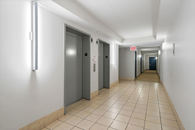 102 Bradhurst Ave Unit 906, New York Manhattan, NY 10039 - hall with elevator and light tile patterned flooring
