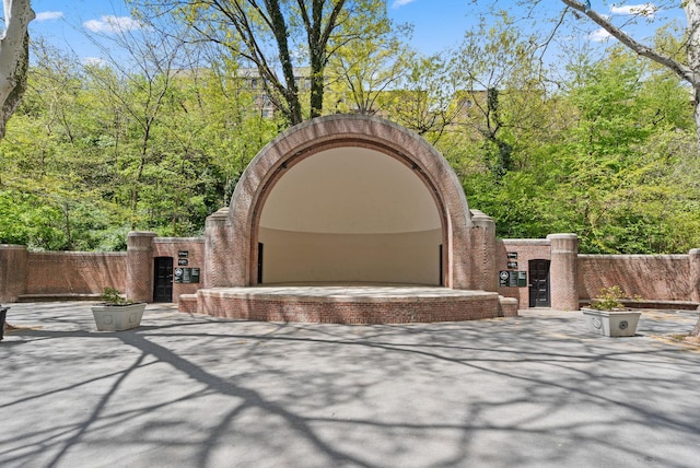 102 Bradhurst Ave Unit 906, New York Manhattan, NY 10039 - view of patio featuring a gate