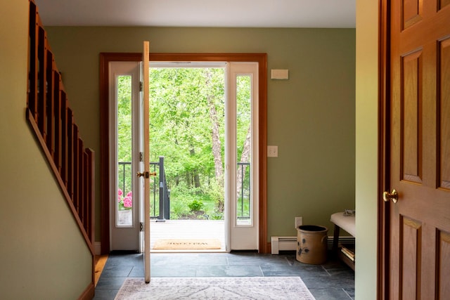 1401 State Route 28a, Hurley, NY 12491 - foyer entrance with stone tile floors, a baseboard radiator, and baseboards