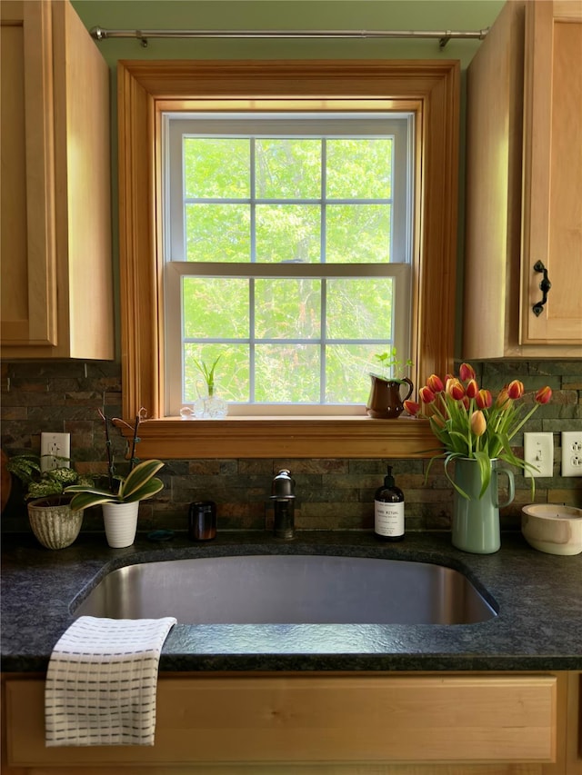 1401 State Route 28a, Hurley, NY 12491 - kitchen view of a sink, backsplash, and dark countertops