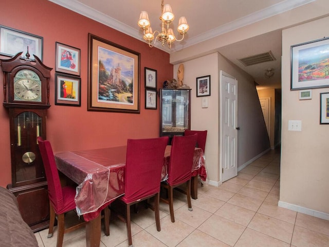 105 Surf Dr Unit 25, Bronx, NY 10473 - dining room with a chandelier, light tile patterned flooring, baseboards, and crown molding