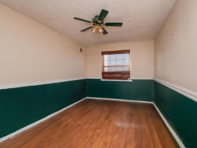 105 Surf Dr Unit 25, Bronx, NY 10473 - spare room featuring wood finished floors, ceiling fan, and baseboards