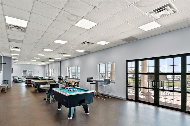 105 Surf Dr Unit 25, Bronx, NY 10473 - game room with billiards table, plenty of natural light, a paneled ceiling, and baseboards