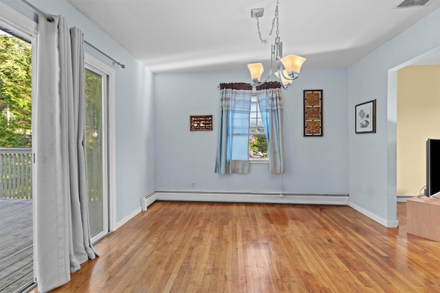 37 Lakeview Rd, Carmel, NY 10512 - unfurnished dining area with a baseboard radiator, a chandelier, light wood-style flooring, and healthy amount of natural light