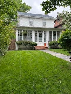 4321 220th Pl, Bayside, NY 11361 - view of front of house with a sunroom