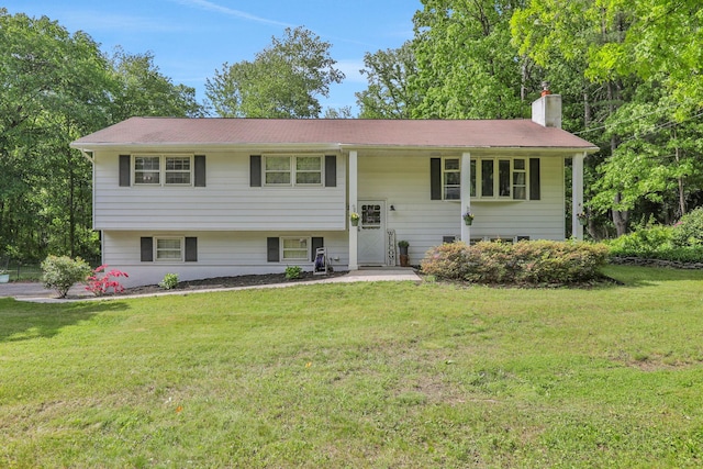 33 Greentree Dr N, Hyde Park, NY 12538 - raised ranch with a chimney and a front lawn