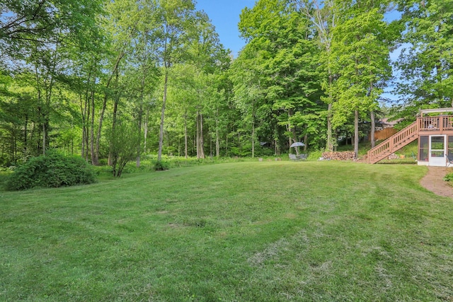 33 Greentree Dr N, Hyde Park, NY 12538 - view of grassy yard with stairs and a deck