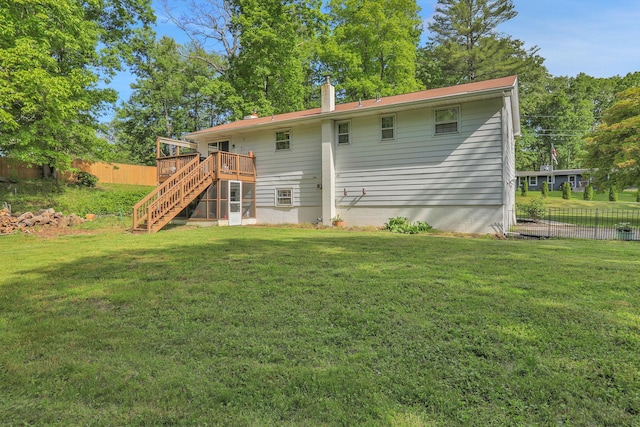 33 Greentree Dr N, Hyde Park, NY 12538 - back of property with stairway, a wooden deck, and a chimney